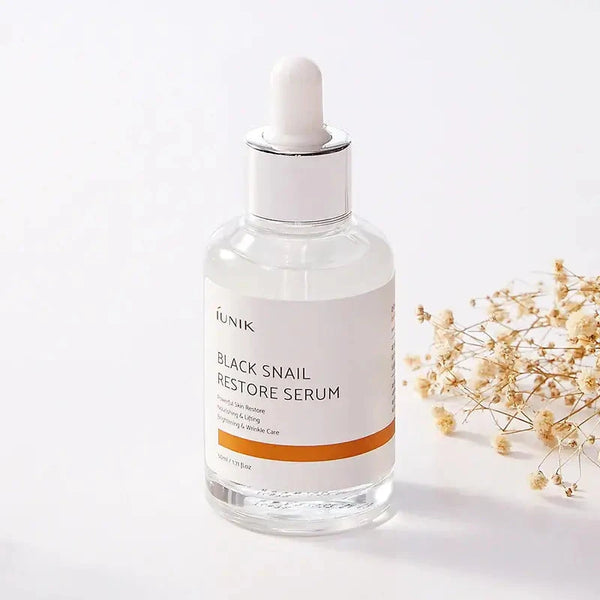 Serums ar melnā gliemeža mucīnu ādas atjaunošanai iUnik Black Snail Restore Serum